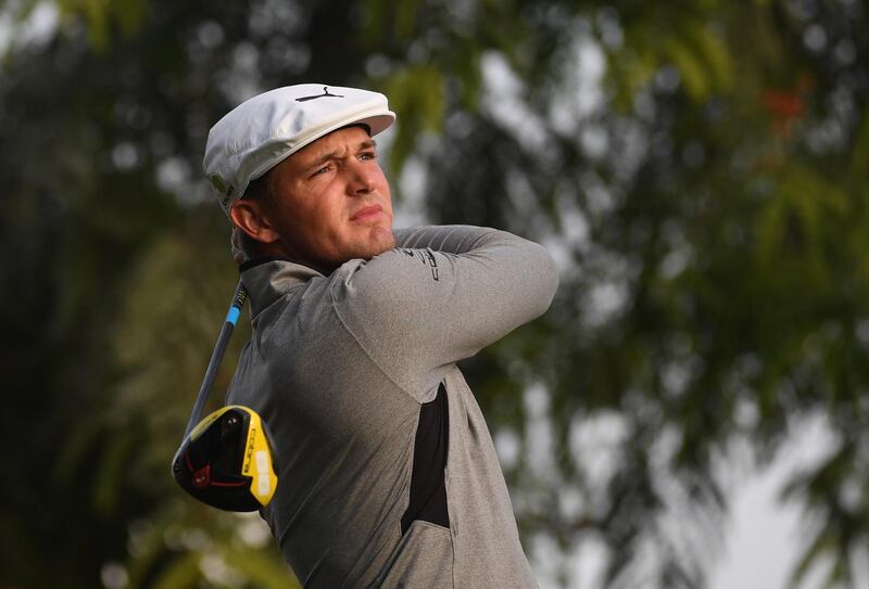 epa07314307 Bryson Dechambeau of the United States tees off at the 10th hole in round one of the Dubai Desert Classic golf tournament in Dubai, UAE, 24 January 2019.  EPA/MARTIN DOKOUPIL