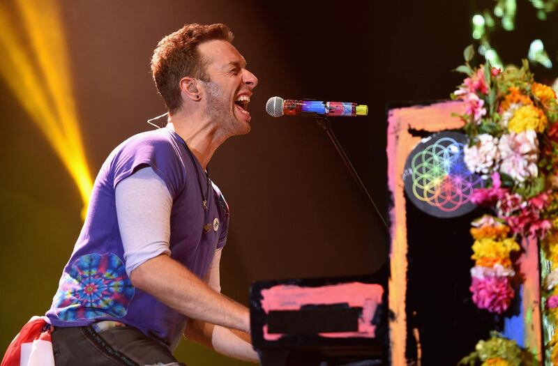 LONDON, ENGLAND - JUNE 28:  Chris Martin from Coldplay performs on stage during the Sentebale Concert at Kensington Palace on June 28, 2016 in London, England. Sentebale was founded by Prince Harry and Prince Seeiso of Lesotho over ten years ago. It helps the vulnerable and HIV positive children of Lesotho and Botswana.  (Photo by Tabatha Fireman/Getty Images)