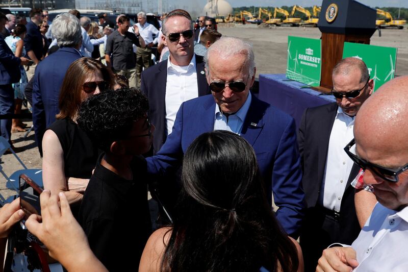 Mr Biden speaks to people after delivering remarks on climate change in Somerset, Massachusetts, on July 20. Reuters