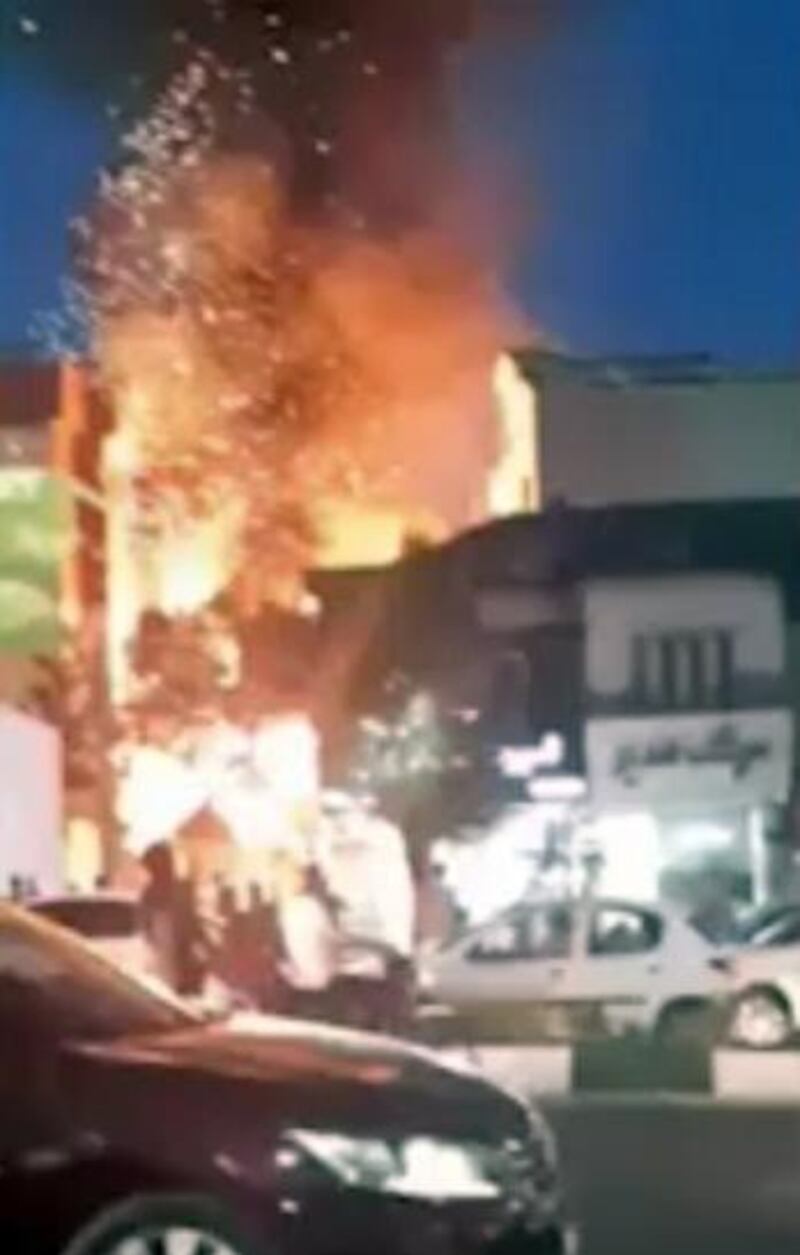 A handout photo made available from a video by Iranian state TV (IRIB) shows the moment of an explosion at the Sina Athar health center in the north of Tehran, Iran.  EPA