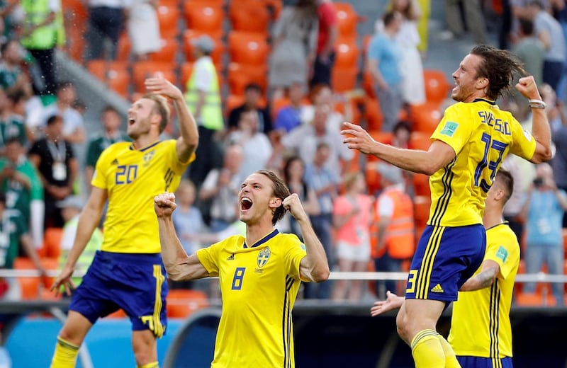 Soccer Football - World Cup - Group F - Mexico vs Sweden - Ekaterinburg Arena, Yekaterinburg, Russia - June 27, 2018   Sweden's Albin Ekdal, Gustav Svensson and Mikael Lustig celebrate after the match       REUTERS/Darren Staples