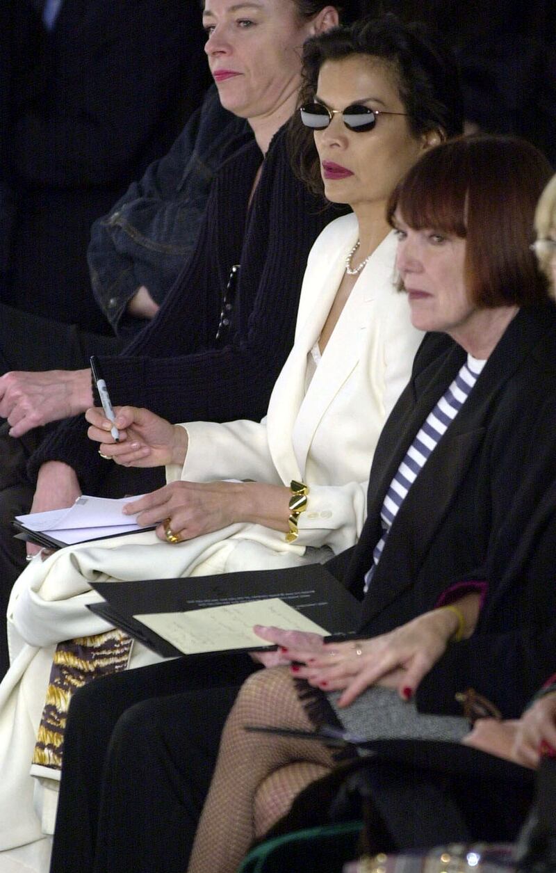 Human Rights campaigner Bianca Jagger, centre, and Quant, right, at a show by designer Jasper Conran at London Fashion Week in February 2001. AP 