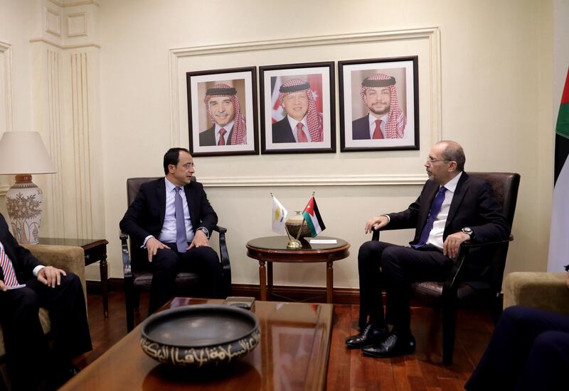 Jordanian Minister of Foreign Affairs Ayman Safadi, right, meets with his Cypriot counterpart Nikos Christodoulides at the Foreign Ministry office in Amman, Jordan.  EPA