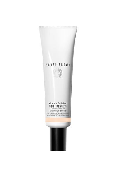 Opt for a high-factor SPF topped up with SPF-infused make-up, such as Bobbi Brown's Vitamin Enriched Skin Tint SPF 15, Dh229. Photo: Bobbi Brown
