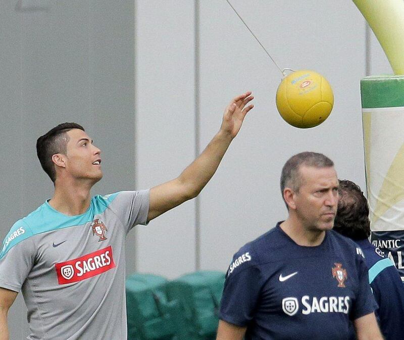 Cristiano Ronaldo plays with a tethered ball during his fitness training ahead of the 2014 World Cup on Tuesday. Ray Stubblebine / Reuters / June 3, 2014