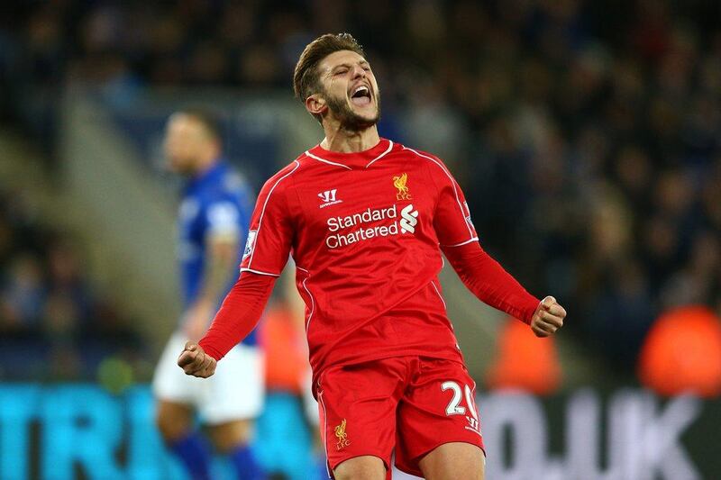 Adam Lallana of Liverpool celebrates after scoring an early equaliser in his side's eventual 3-1 win over Leicester City on Tuesday. Clive Mason / Getty Images
