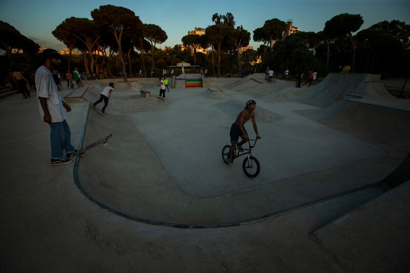 Skateboarders and bike riders explore the pavement at Snoubar Skatepark.