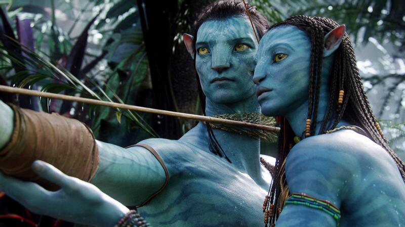 FILE - This image released by 20th Century Fox shows the characters Neytiri, right, and Jake in a scene from the 2009 movie "Avatar." The Walt Disney Co. on Tuesday laid out its plans for upcoming 20th Century Fox films. James Cameronâ€™s long-delayed â€œAvatar 2â€ will now open in theaters in December 2021 instead of its most recent date of December 2020. The two subsequent â€œAvatarâ€ sequels will move to 2023 and 2025, respectively. (AP Photo/20th Century Fox, File)
