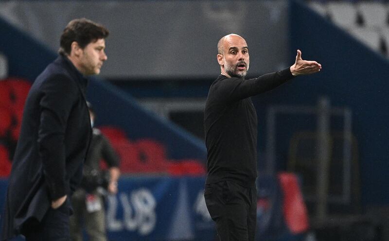 Manchester City manager Pep Guardiola gives his instructions next to Paris Saint-Germain  coach Mauricio Pochettino. AFP