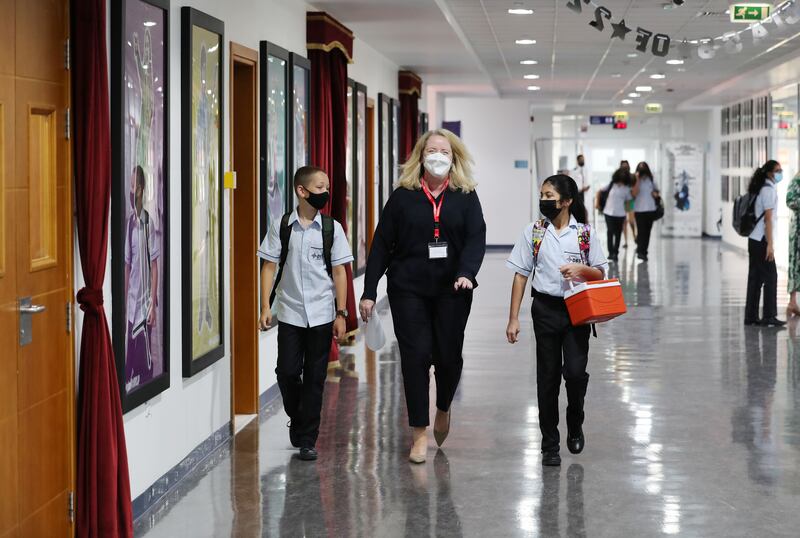 Dubai British School pupils arrive for the first day of school after the summer holidays. Chris Whiteoak / The National