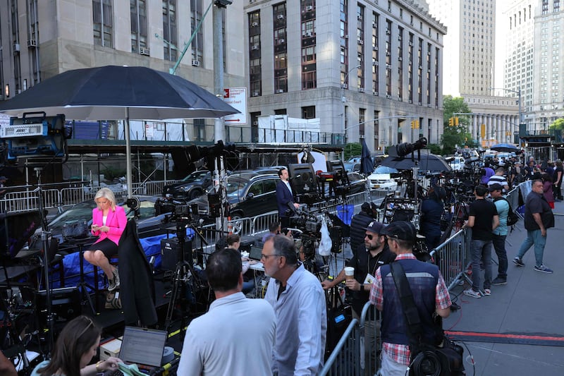 Members of the media wait in front of the courthouse in Manhattan. Getty Images / AFP