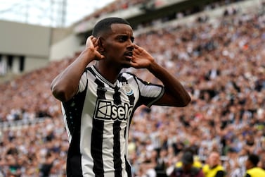 Newcastle United's Alexander Isak celebrates scoring their side's second goal of the game with Bruno Guimaraes during the Premier League soccer match between Newcastle United and Aston Villa at St.  James' Park, Newcastle upon Tyne, England, Saturday Aug.  12, 2023.  (Owen Humphreys / PA via AP)