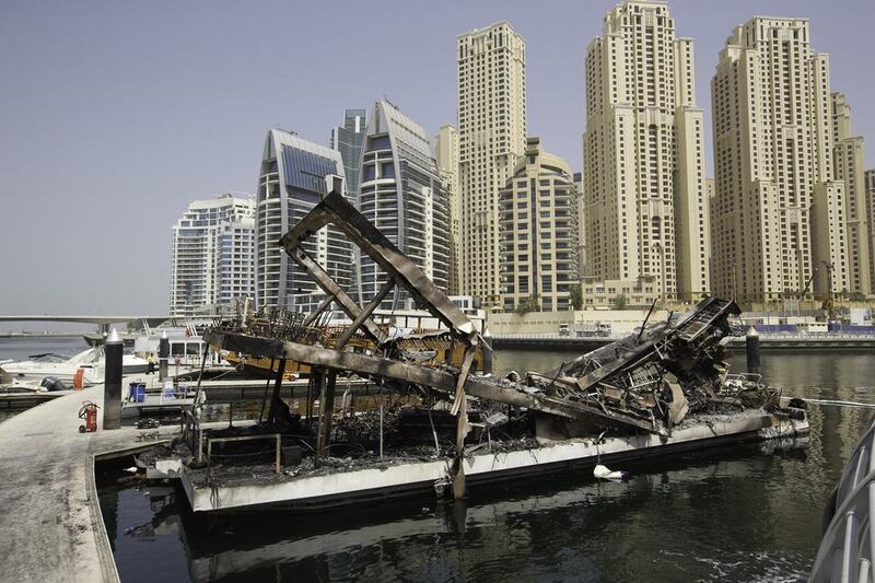 The restaurant boat after a fire at Dubai Marina Promenade. Jaime Puebla / The National 