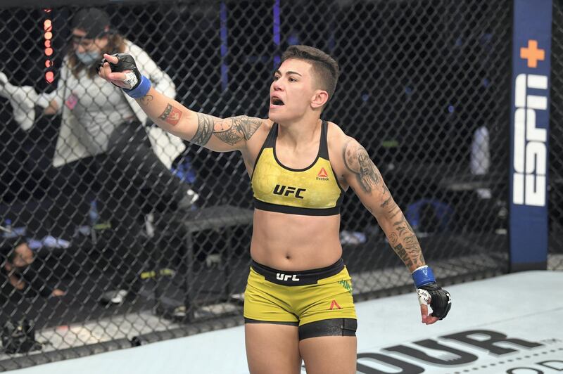 ABU DHABI, UNITED ARAB EMIRATES - OCTOBER 18:  Jessica Andrade of Brazil celebrates her TKO victory over Katlyn Chookagian in their women's flyweight bout during the UFC Fight Night event inside Flash Forum on UFC Fight Island on October 18, 2020 in Abu Dhabi, United Arab Emirates. (Photo by Josh Hedges/Zuffa LLC via Getty Images)