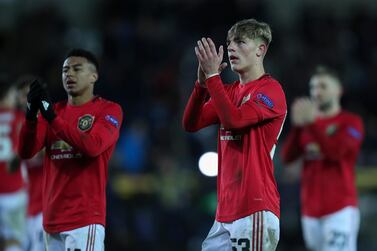 Manchester United's Brandon Williams applauds supporters at the end of the Europa League match against Bruges. AP