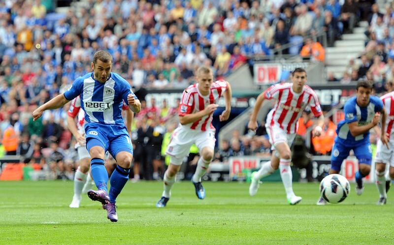 WIGAN, ENGLAND - SEPTEMBER 01:  Shaun Maloney of Wigan Athletic scores the opening goal from the penalty spot during the Barclays Premier League match between Wigan Athletic and Stoke City at DW Stadium on September 1, 2012 in Wigan, England.  (Photo by Chris Brunskill/Getty Images) *** Local Caption ***  151104194.jpg