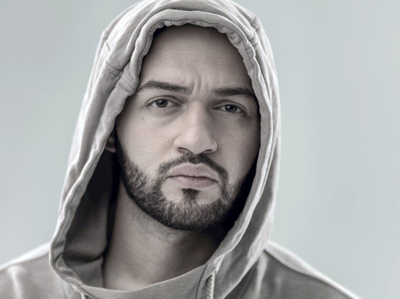 Rising rapper Julian, who has lived in Dubai for 13 years, was born to Iraqi parents in Detroit. Courtesy Fares Jamal