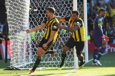 WATFORD, ENGLAND - SEPTEMBER 02:  Craig Cathcart of Watford celebrates with his captain Troy Deeney after scoring the winner during the Premier League match between Watford FC and Tottenham Hotspur at Vicarage Road on September 2, 2018 in Watford, United Kingdom.  (Photo by Mike Hewitt/Getty Images)