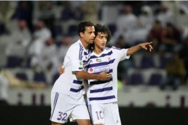 Omar Abdulrahman, right, and Alex Brosque will look to bring the Asian Chamions League back to Al Ain, who last won it in 2003. Jaime Puebla / The National
