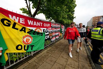 Fans protest against the Manchester United owners in August. PA