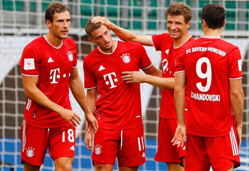 Bayern Munich midfielder Mickael Cuisance, centre, celebrates scoring his side's second goal. AFP