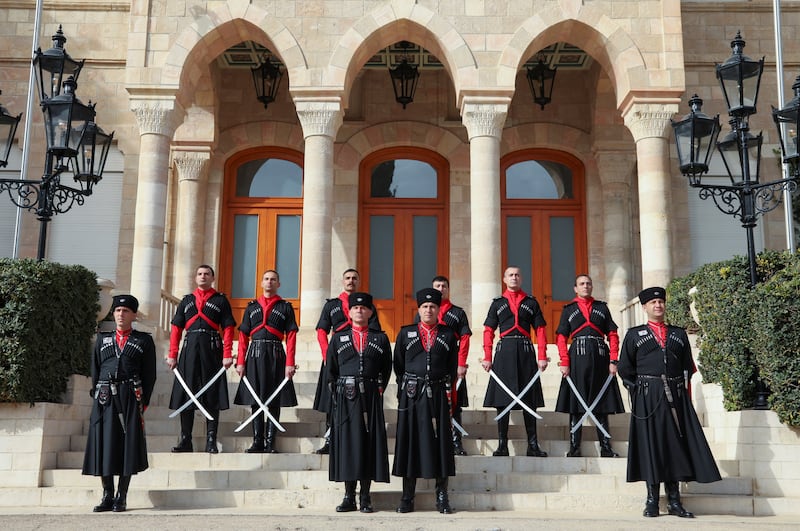 The Circassian honour guards' Commander, Ayman Yacoub, and Assistant Commander, Hytham Hakho, stand with other members at the royal court in Amman, Jordan. Photos: Reuters