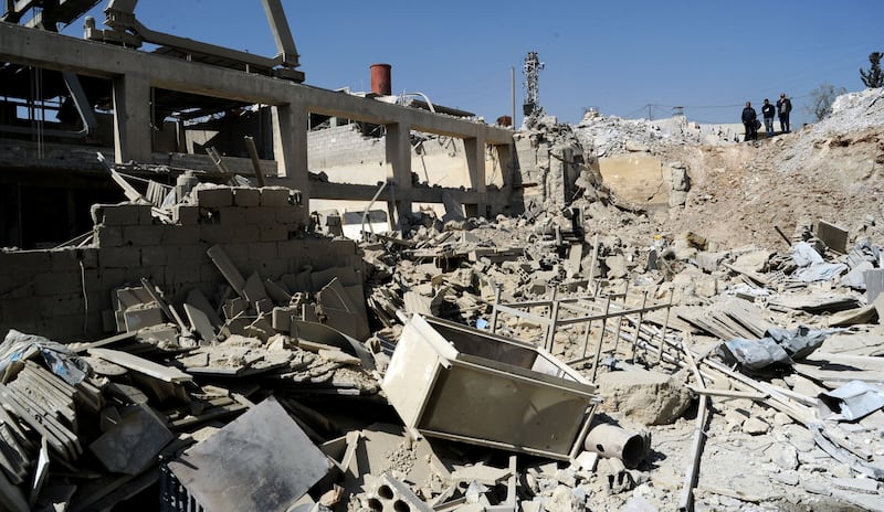 Damage reported by the Syrian state media in Damascus in March. Reuters