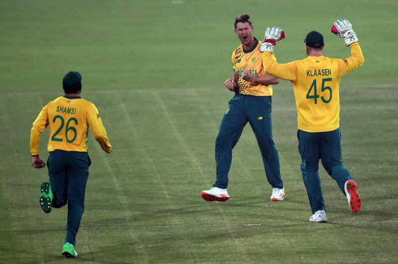 South Africa's Dwaine Pretorius celebrates with teammates after taking the wicket of Pakistan's Muhammad Nawaz. AFP
