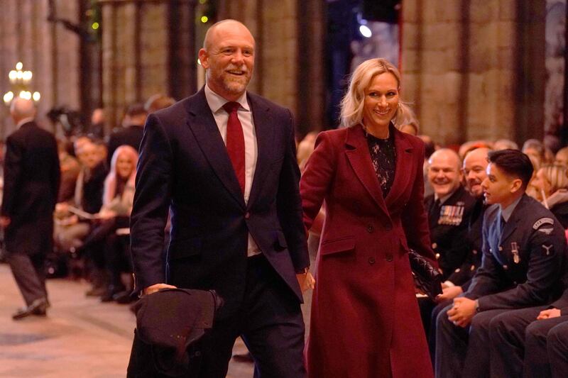 Zara Tindall and her husband Mike Tindall arrive for the service. AFP