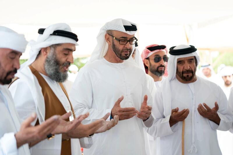 ABU DHABI, UNITED ARAB EMIRATES - November 20, 2019: HH Sheikh Mohamed bin Zayed Al Nahyan, Crown Prince of Abu Dhabi and Deputy Supreme Commander of the UAE Armed Forces (2nd R) and HH Sheikh Saif bin Mohamed Al Nahyan (R) attend the burial of the late HH Sheikh Sultan bin Zayed Al Nahyan, UAE President's Representative.

( Mohamed Al Hammadi / Ministry of Presidential Affairs )
---