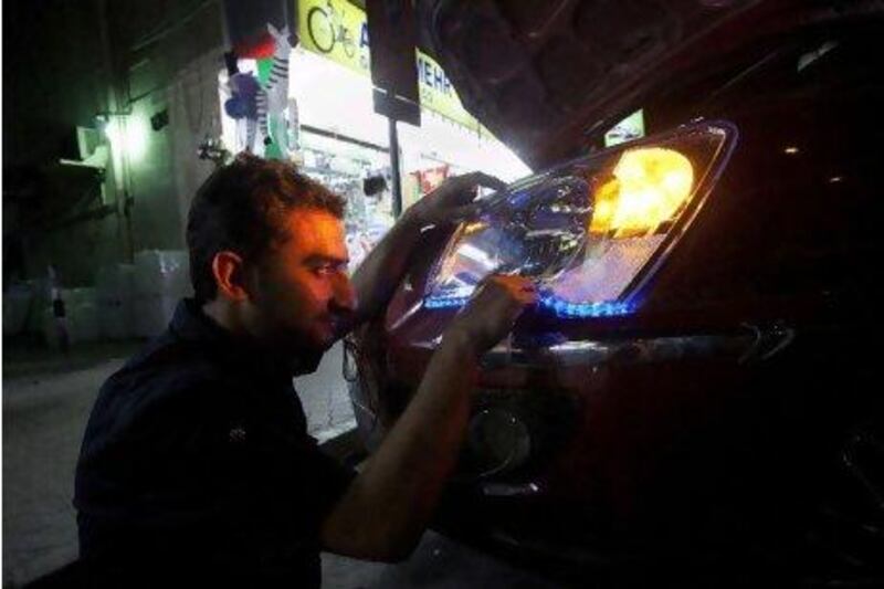 Need a string of LED lights for your ride? You'll find them for a good price in Satwa, but lately fewer and fewer car owners are using the small shops there to modify their motors. Jaime Puebla / The National
