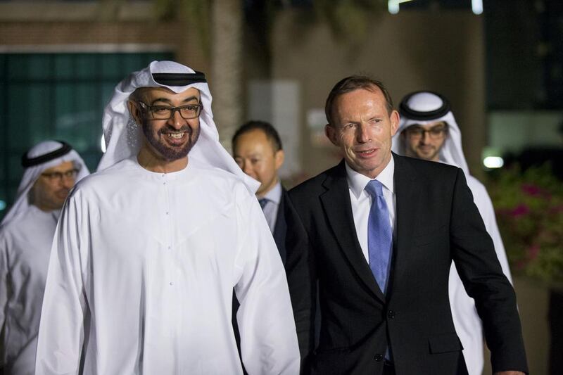 Sheikh Mohammed bin Zayed, Crown Prince of Abu Dhabi and Deputy Supreme Commander of the Armed Forces, hosted a dinner in honour of Tony Abbott, the prime minister of Australia. Also present were Dr Anwar Gargash, Minister of State for Foreign Affairs, back left, and Sheikh Sultan bin Hamdan bin Zayed, back right. Ryan Carter / Crown Prince Court – Abu Dhabi 
