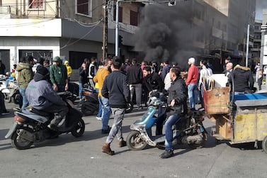 Smoke rises as demonstrators protest against the lockdown and worsening economic conditions in Tripoli, Lebanon. Reuters