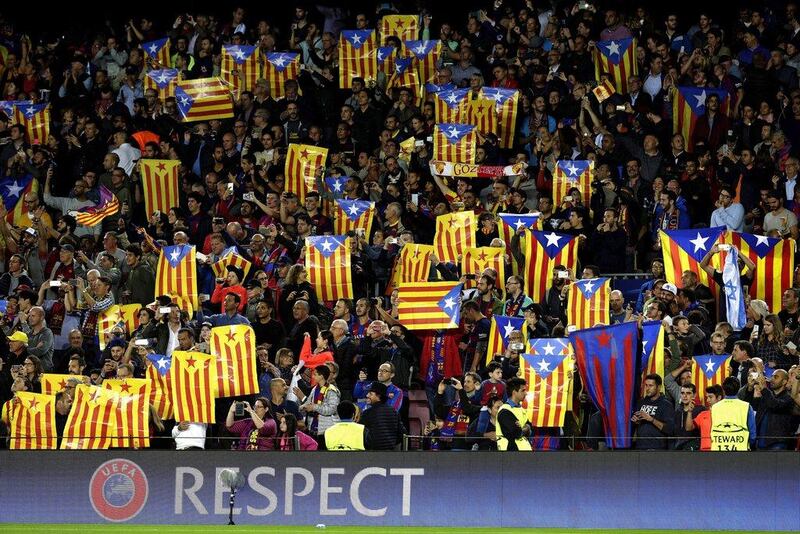Barcelona fans show ‘esteladas’ the Catalonia flag, and a symbol of the Catalan independence movement. Alberto Estevez / EPA