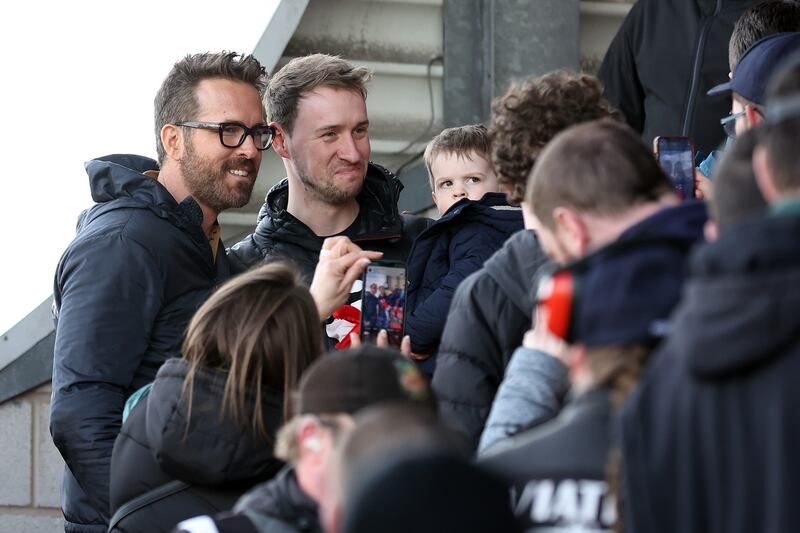 Ryan Reynolds, co-owner of Wrexham interacts with fans. Getty Images