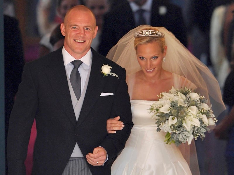 Britain's Zara Phillips, the eldest granddaughter of Queen Elizabeth, and her husband England rugby player Mike Tindall leave Canongate Kirk in Edinburgh after their marriage Saturday July 30, 2011.  (AP Photo/Dylan Martinez, Pool) *** Local Caption ***  APTOPIX Britain Royal Wedding.JPEG-06af5.jpg