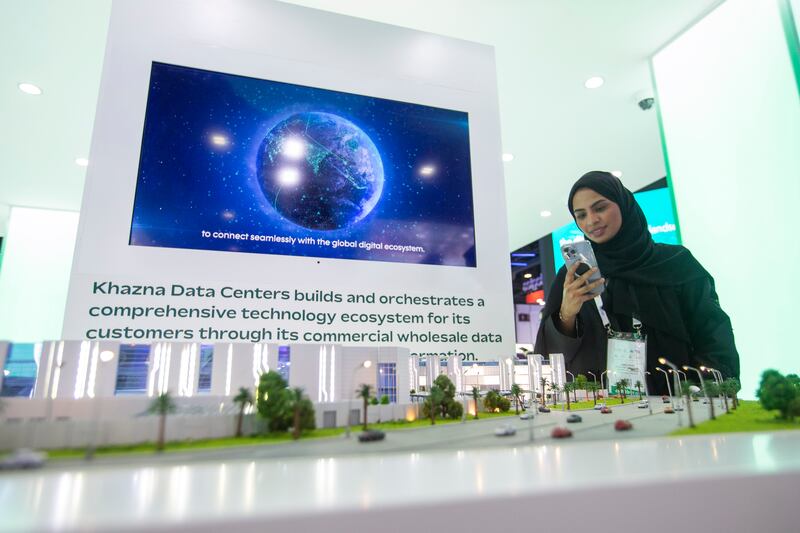 Khazna's stand at the Gitex Technology Week in Dubai on Monday. The company plans to establish a presence in new markets outside the UAE. Leslie Pableo for The National