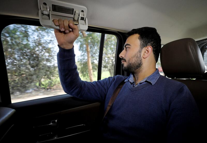 Amjad Yaghi rides on the way to see his mother after 20 years of separation. Reuters