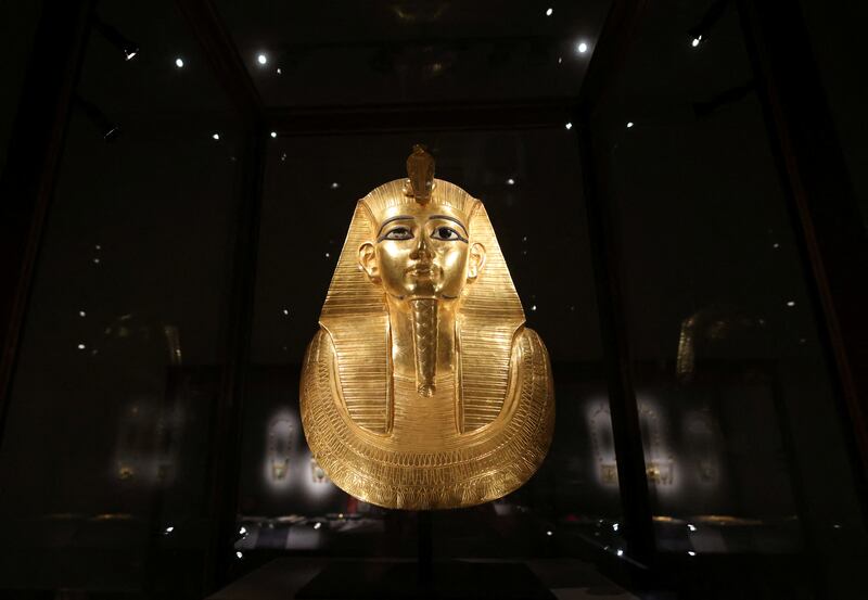 The golden funerary mask of King Psusennes I is displayed at the new archaeology wing