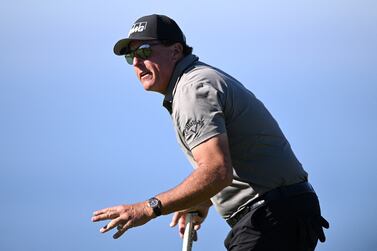 FILE PHOTO: Jan 27, 2022; San Diego, California, USA; Phil Mickelson acknowledges the crowd after a putt on the fourth green during the first round of the Farmers Insurance Open golf tournament at Torrey Pines Municipal Golf Course - South Course.  Mandatory Credit: Orlando Ramirez-USA TODAY Sports / File Photo