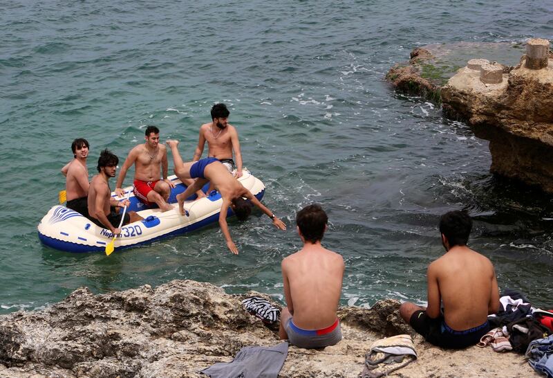 Boys enjoy the water on May 5 as Lebanon extended a shutdown to curb the spread of Covid-19, Beirut's seaside Corniche, Lebanon. Lebanon is a relatively water-rich country in a water-scarce region. However, the country suffers from a problem common in the developing world: one of poor and ineffective integrated water resource management. Even some of Beirut’s wealthiest neighbourhoods lack access to a regular supply of water and are forced to rely on tankers. Aziz Taher / Reuters