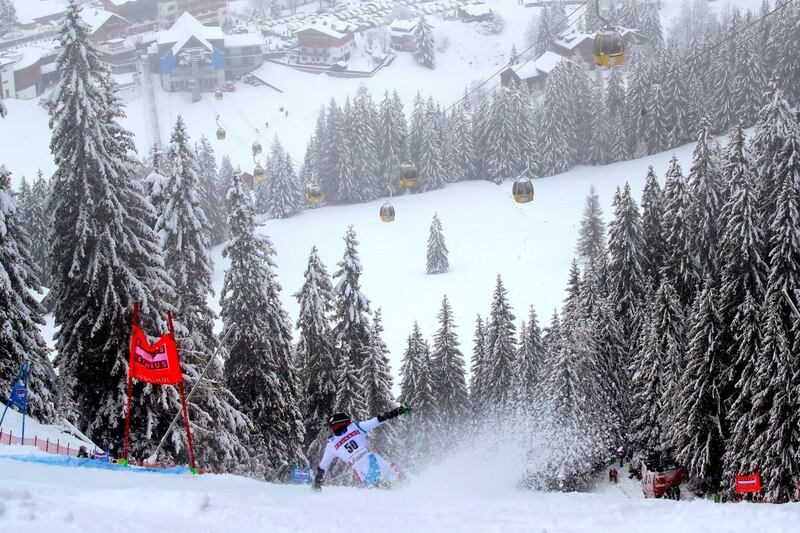 Switzerland's Daniel Sette competes during an alpine ski, men's World Cup giant slalom, in Alta Badia, in northern Italy, Sunday, Dec. 22, 2019. (AP Photo/Alessandro Trovati)