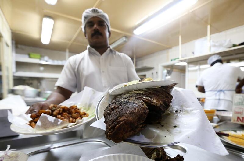 Staff serve customers during the evening.