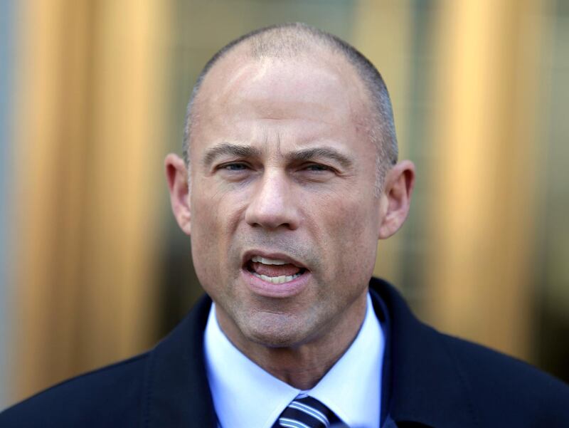 FILE - In this Thursday, April 26, 2018, file photo, Michael Avenatti, Stormy Daniels' attorney, talks to reporters outside of federal court in New York. Avenatti says he has information showing that President Donald Trumpâ€™s longtime personal attorney, Michael Cohen, received $500,000 from a Russian billionaire within months of paying hush money to Daniels. (AP Photo/Seth Wenig, File)