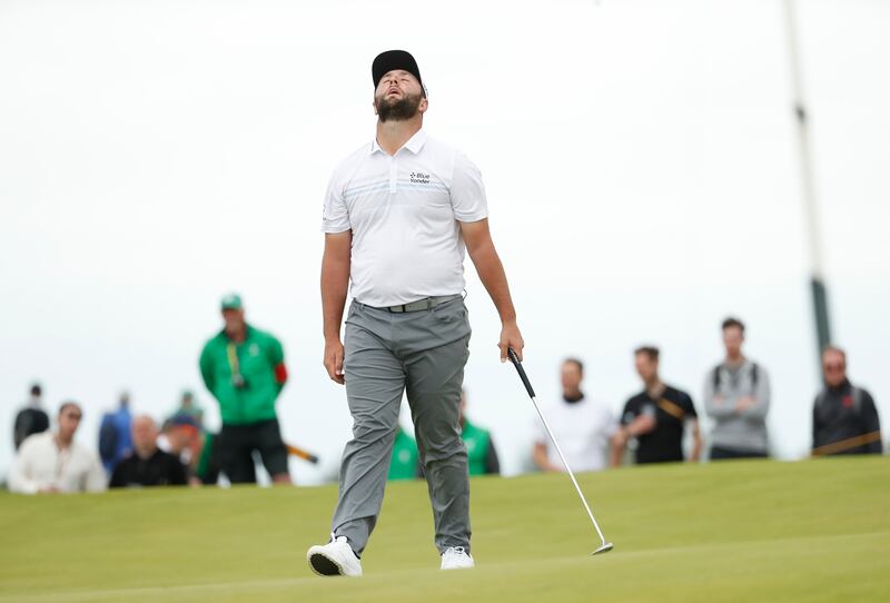 Spain's Jon Rahm reacts after missing a putt on the 17th green. The reigning US Open champion finished with a first-round 71.