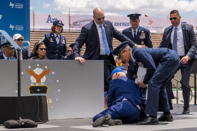 President Joe Biden falls on stage during the 2023 US Air Force Academy graduation ceremony in Colorado Springs. AP