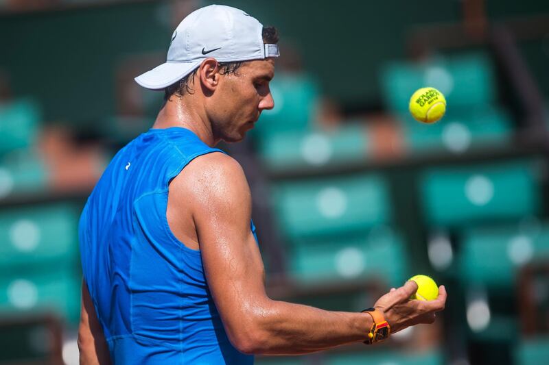 epa06761956 Rafael Nadal of Spain during a training session on a court at Roland Garros in Paris, France, 25 May 2018. The 117th French Open tennis tournament starts with its first round matches on 27 May 2017.  EPA/CHRISTOPHE PETIT TESSON