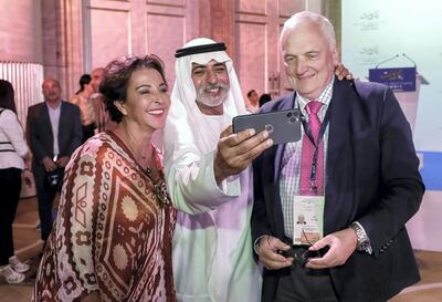 Abu Dhabi, United Arab Emirates, October 13, 2019.   Beirut Institute Summit at The St. Regis Abu Dhabi - Corniche. -- Address by Host Country- His Excellency Sheikh Nahayan Mabarak Al Nahayan takes a selfie with Ms. Raghida Dergham and  Nik Gowing.Victor Besa / The NationalSection:  NAReporter:  Dan Sanderson
