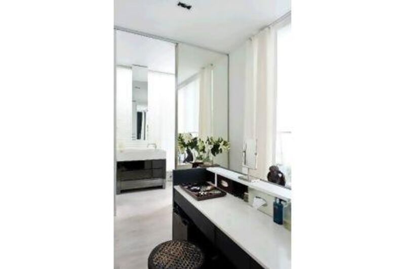 The ensuite bathroom in the master bedroom features a custom-made dressing table. Photos by Tanet Chantaket / Red Cover