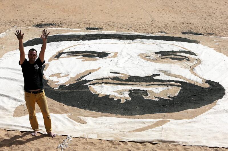 

The Canadian-born artist Sylvain Tremblay created a massive portrait of Sheikh Zayed in the desert near Dubai. Pawan Singh / The National 

